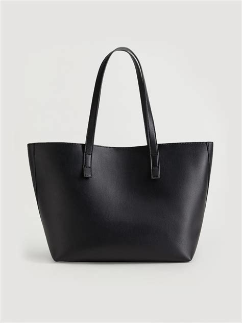 Mango's Bag Is So Similar To This Designer Style.